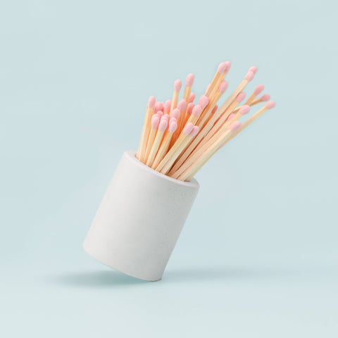 White Round Vessel with Color Matchsticks