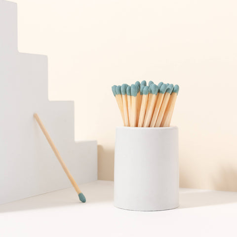 White Round Vessel with Color Matchsticks