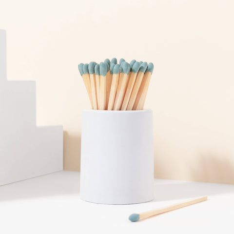 White Round Vessel with Color Matchsticks